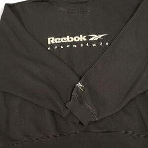 Reebok Essentials— Black Crewneck Sweater